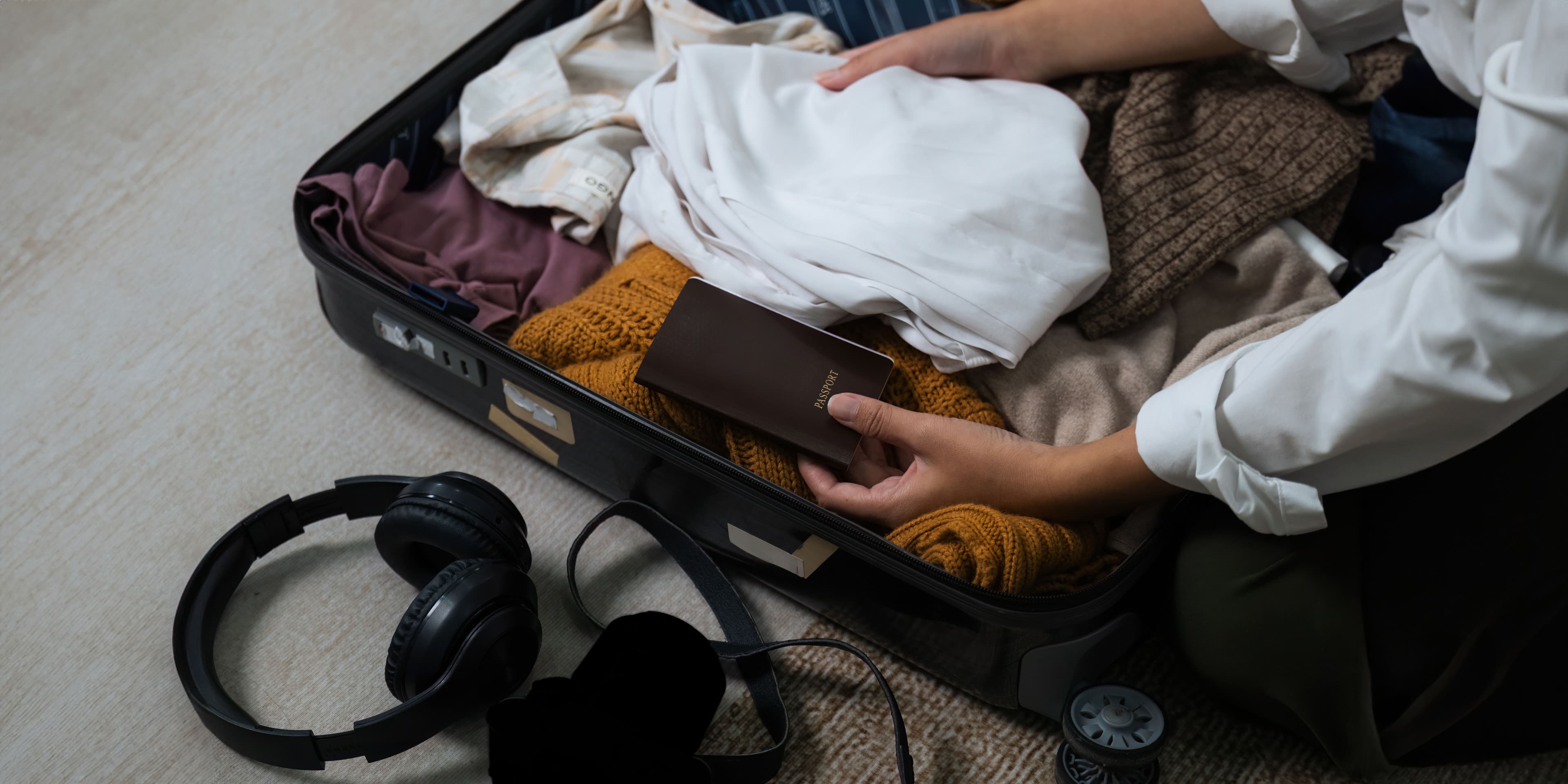 close-up-young-asian-woman-traveler-pack-bags-prepare-travel-season-vacation-concept-travel-lifestyle-active-journey-trip-travel-passport.jpg