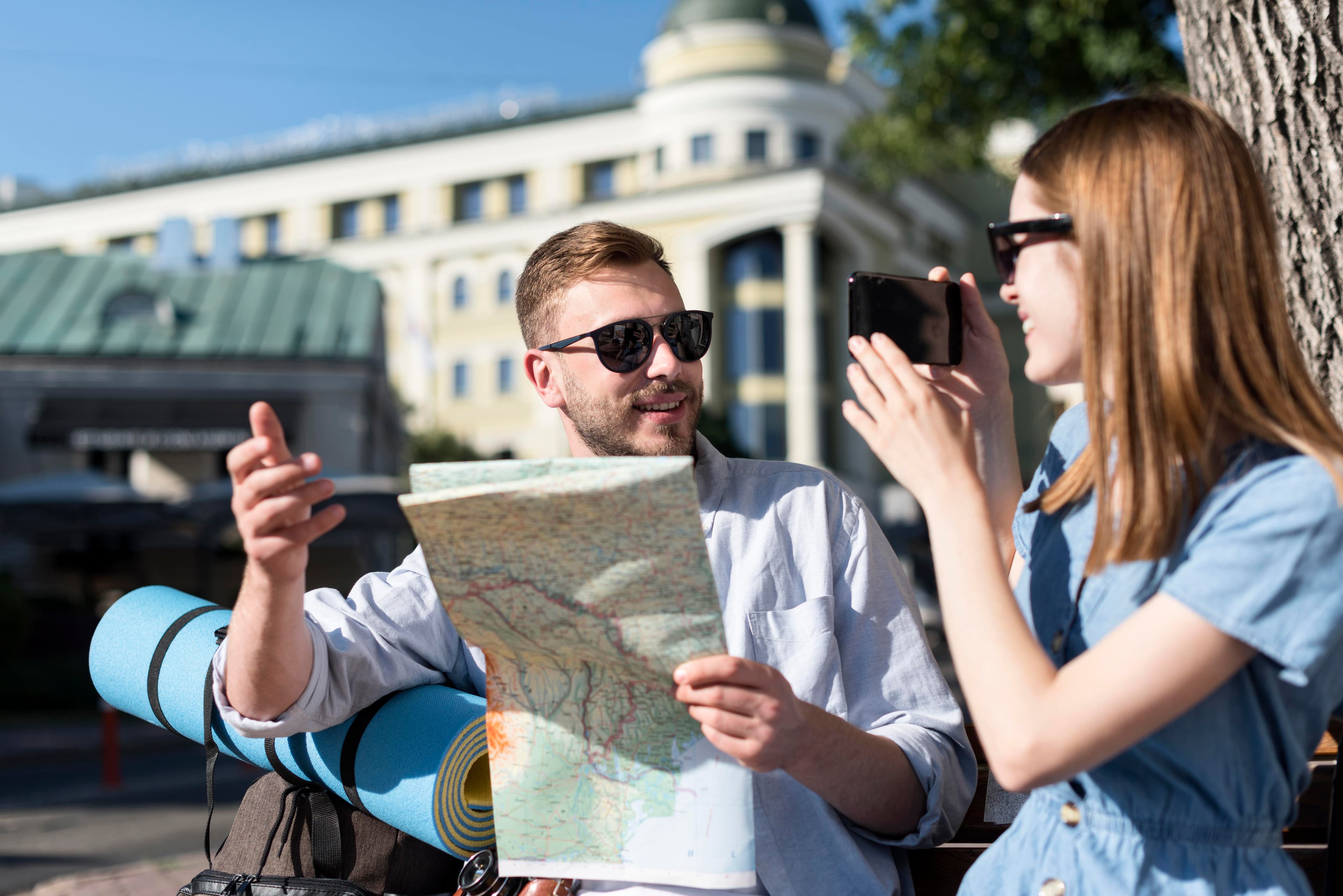couple-outdoors-with-backpack-map.jpg