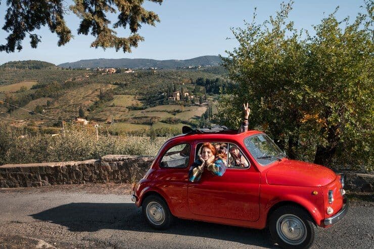 medium-shot-people-traveling-by-car_23-2149204043.jpg
